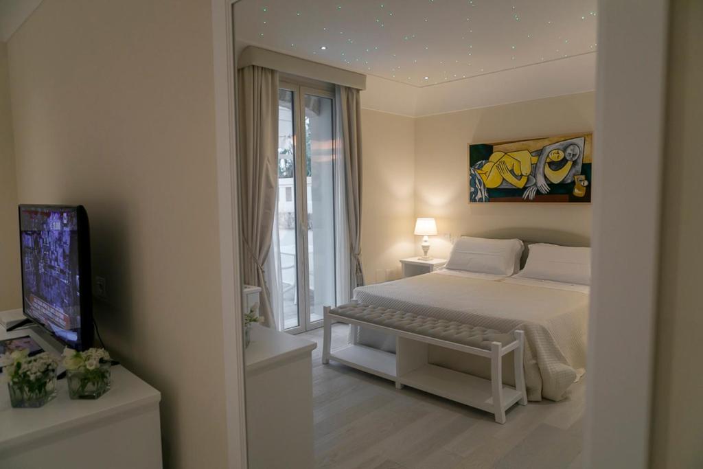 Postel nebo postele na pokoji v ubytování Sangiorgio Resort & Spa