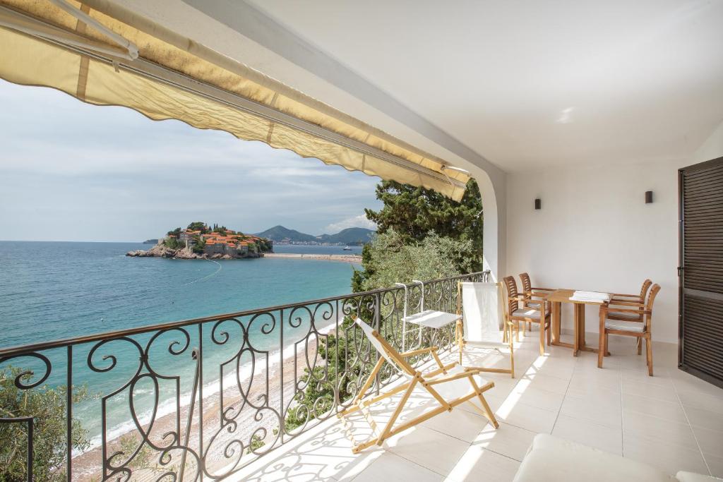 a balcony with a view of the ocean at Apartment Stefan in Sveti Stefan