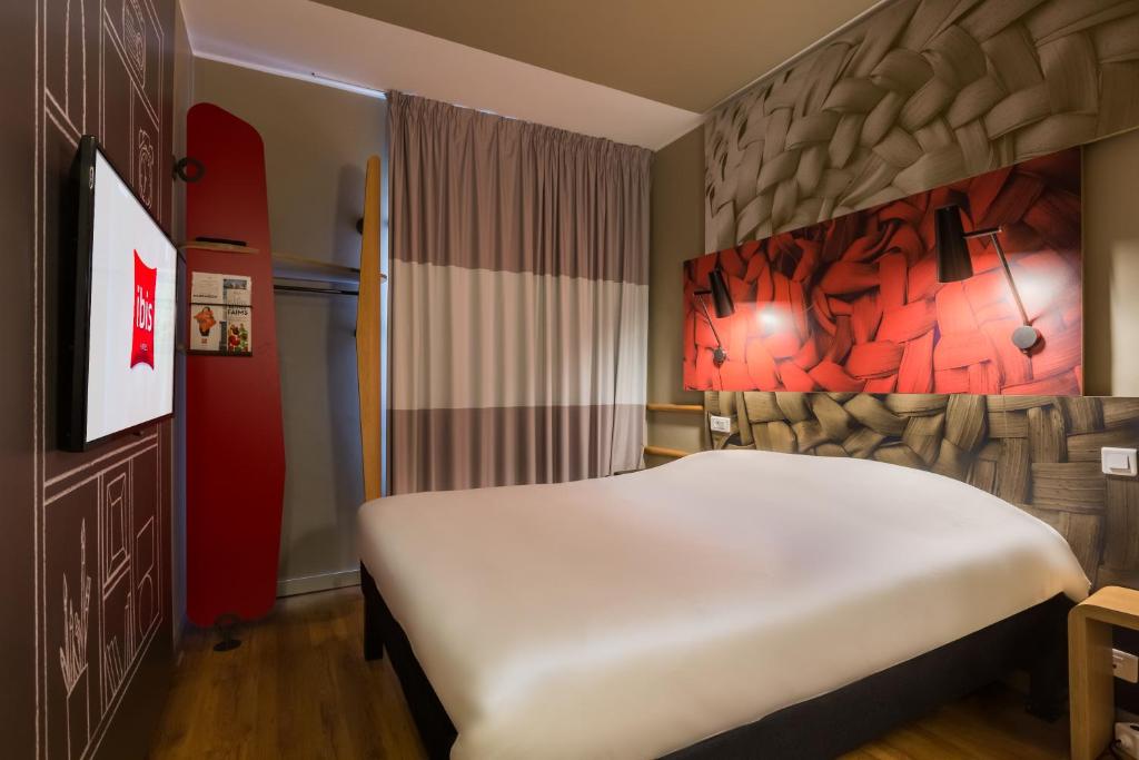 Postel nebo postele na pokoji v ubytování Ibis Marrakech Centre Gare