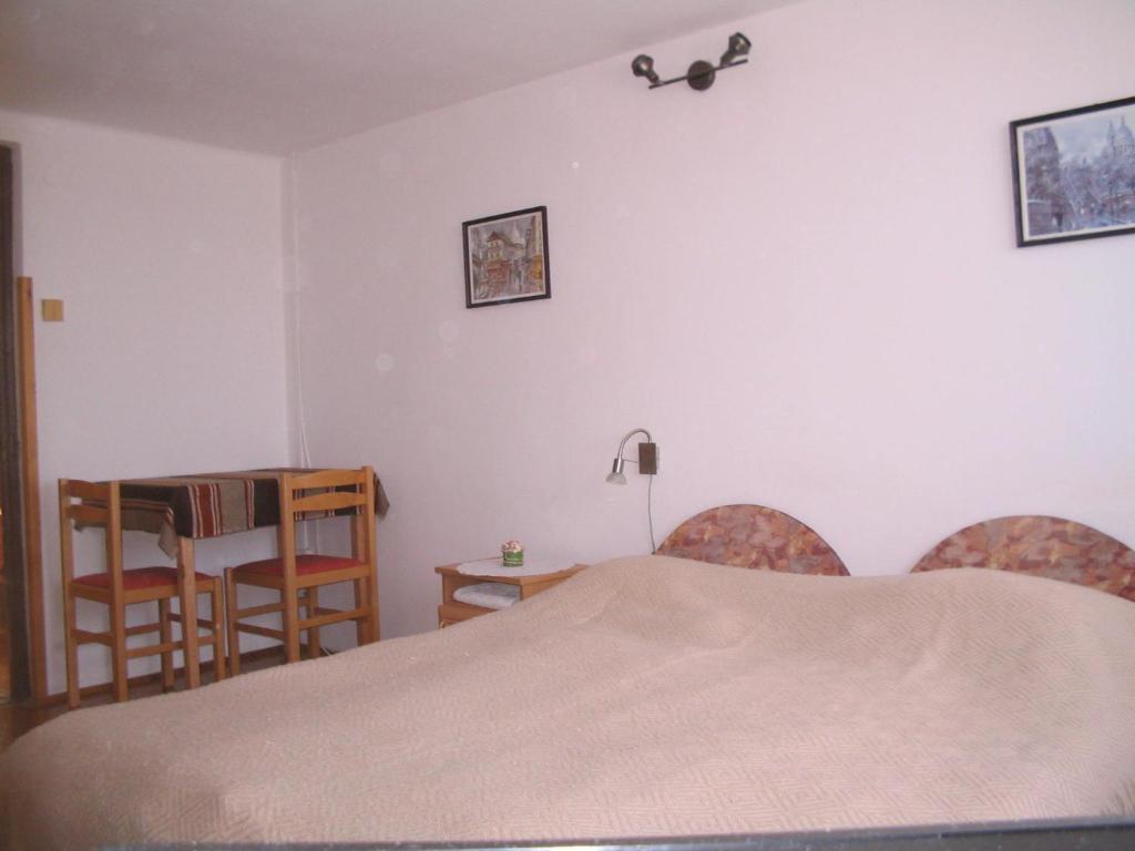 Łóżko lub łóżka w pokoju w obiekcie Burg Eger