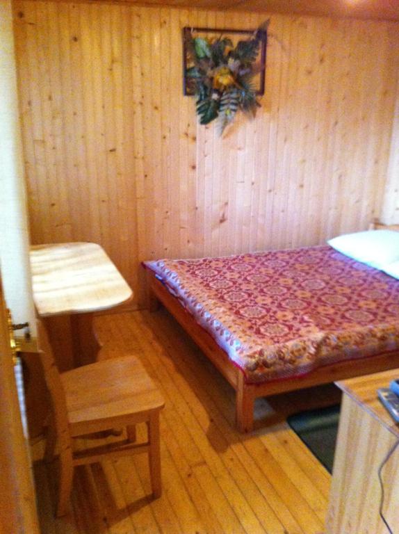 Postel nebo postele na pokoji v ubytování Sykytura