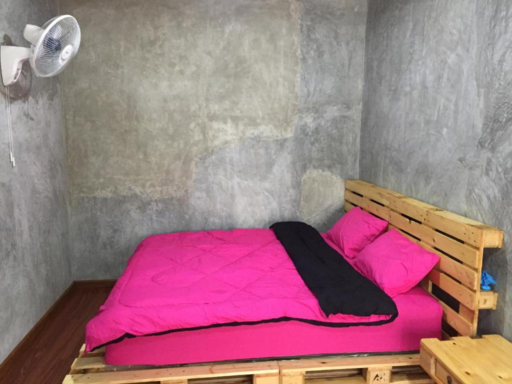 Postel nebo postele na pokoji v ubytování Koh Mak Homestay