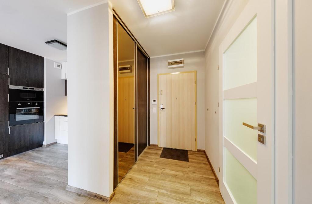 Kuchyňa alebo kuchynka v ubytovaní Sleepway Apartments- Garbary 100-46