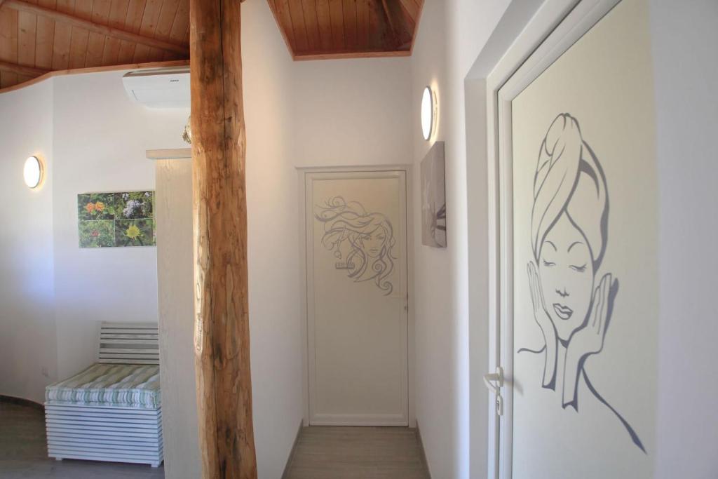 Postel nebo postele na pokoji v ubytování Riva di Ugento Beach Camping Resort