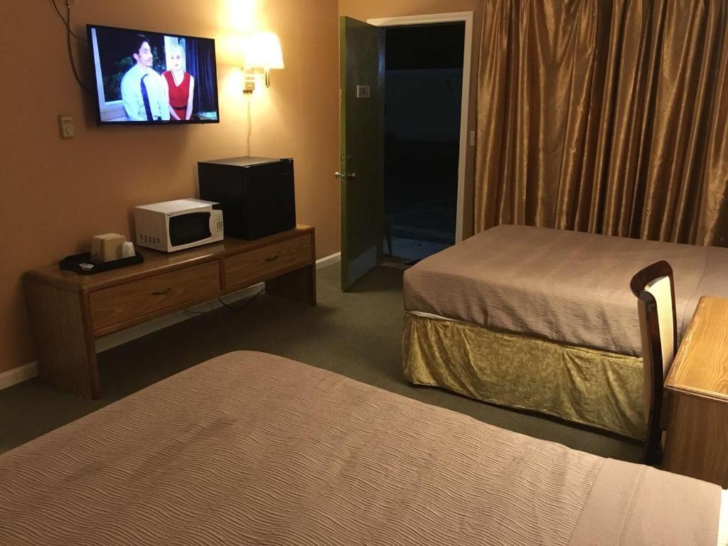 TV a/nebo společenská místnost v ubytování Motel 88