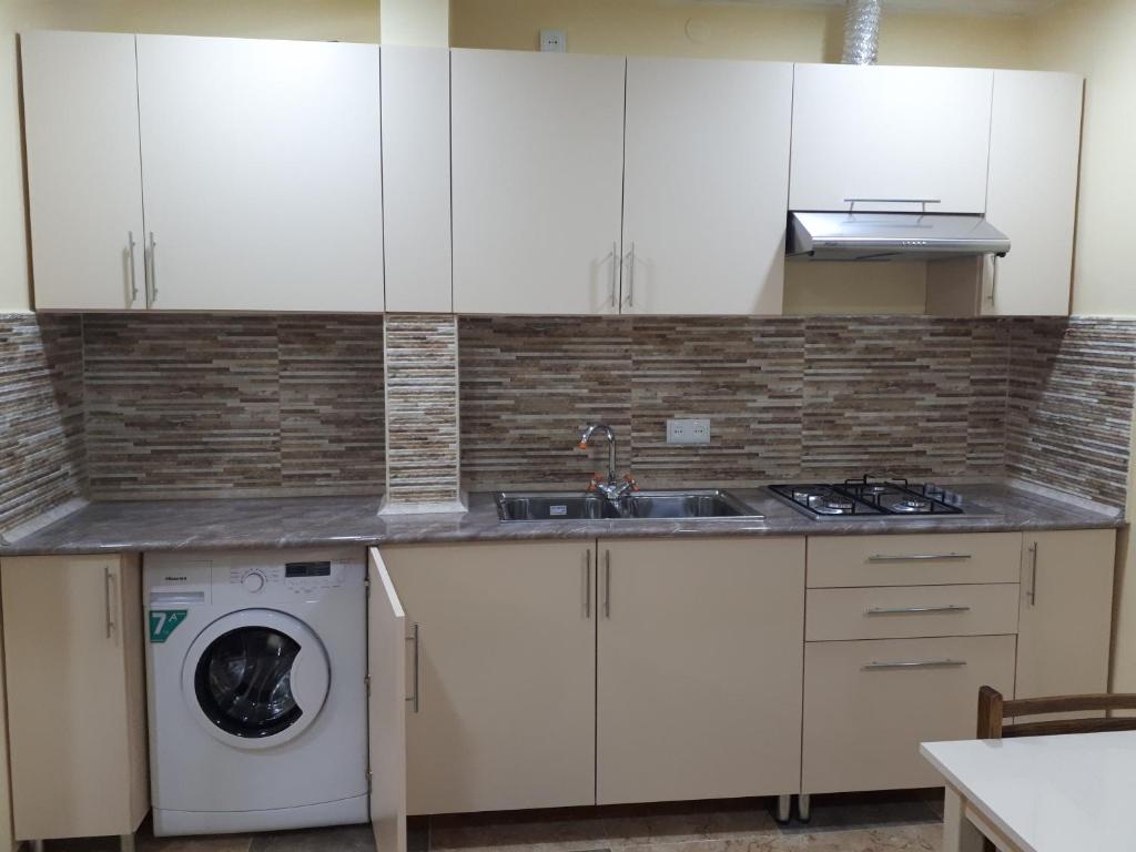 Kuchyň nebo kuchyňský kout v ubytování Narek B&B