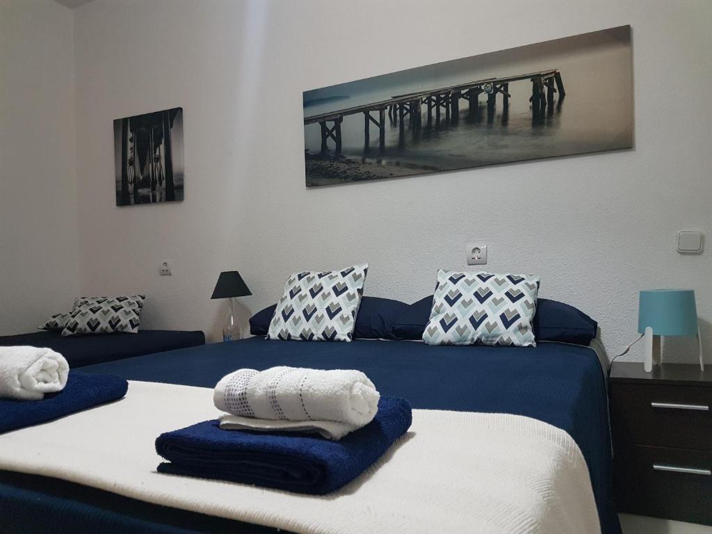 Postel nebo postele na pokoji v ubytování Centric Rooms Mercado