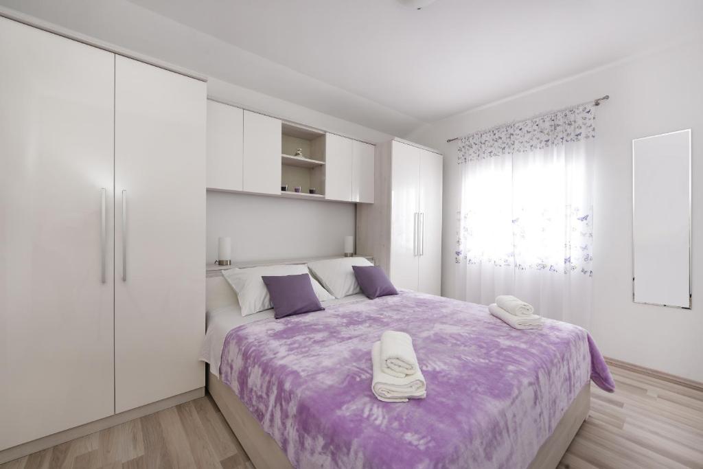 Posteľ alebo postele v izbe v ubytovaní Apartment Monika - Private terrace & Parking