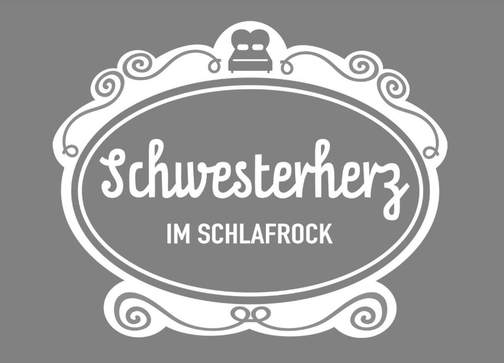 a vector illustration of a vintage silver frame with a sign for a photographer at Schwesterherz im Schlafrock in Merxleben in Bad Langensalza