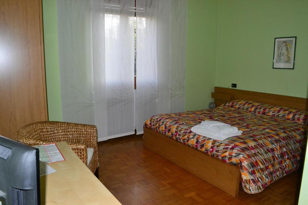 Posteľ alebo postele v izbe v ubytovaní B&B Orio BGY