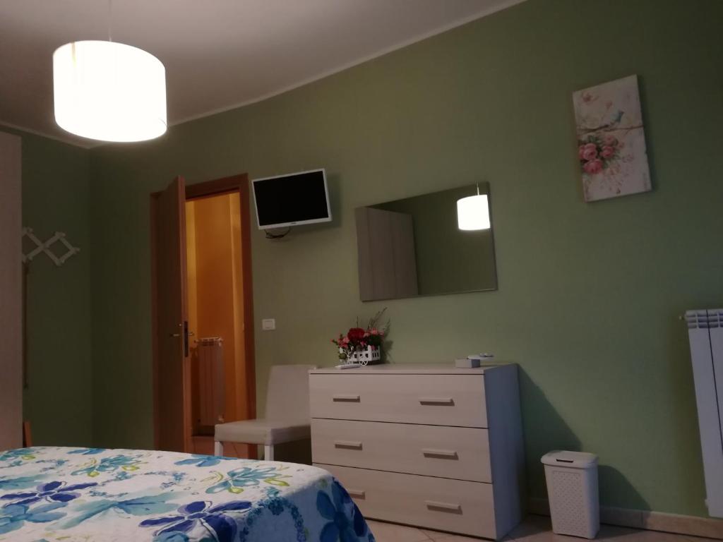 Postel nebo postele na pokoji v ubytování "Profumo di Tiglio"