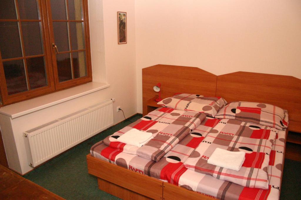 Postel nebo postele na pokoji v ubytování Penzion Pohoda