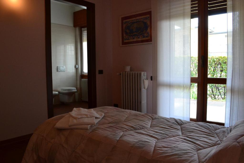 Posteľ alebo postele v izbe v ubytovaní B&B Orio BGY