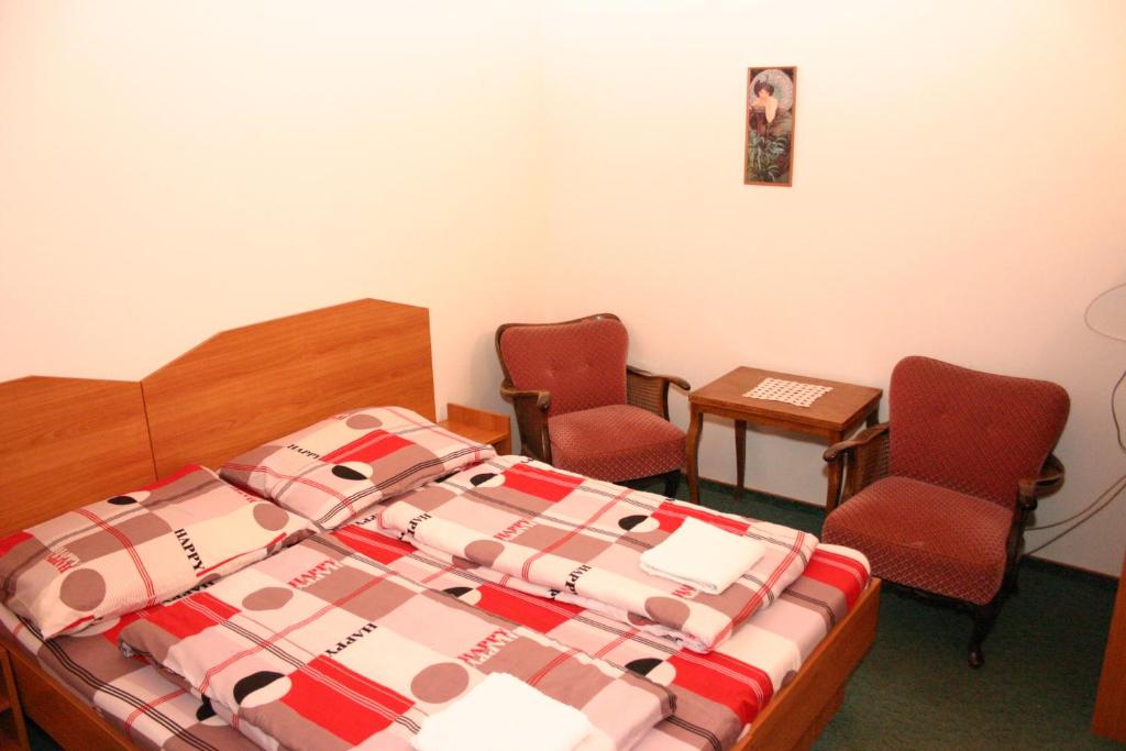 Postel nebo postele na pokoji v ubytování Penzion Pohoda