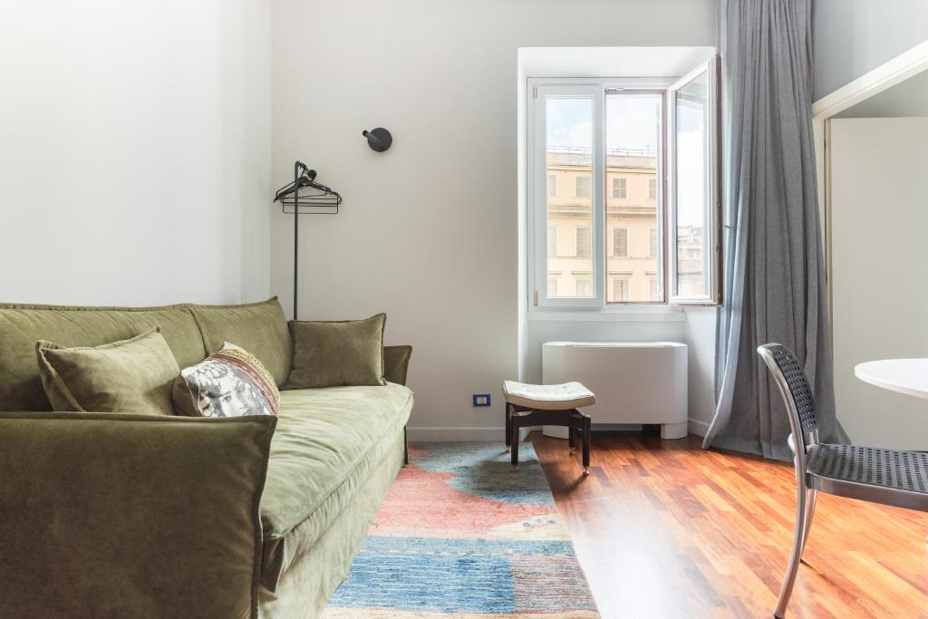 Posezení v ubytování Buonanotte Colosseo