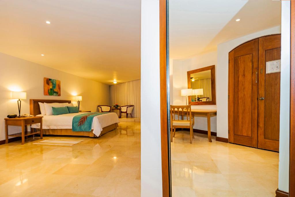 Postel nebo postele na pokoji v ubytování Hotel Almirante Cartagena Colombia