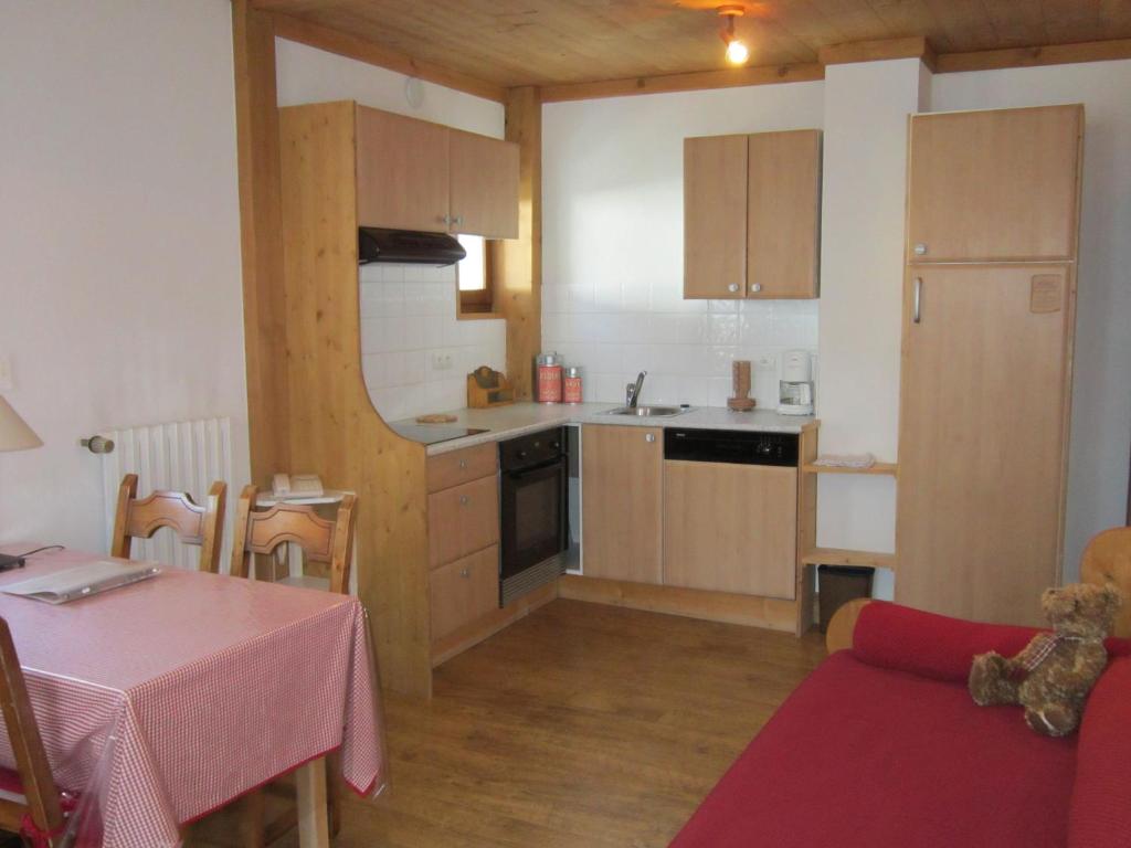 Kuchyň nebo kuchyňský kout v ubytování Logis Hotel Gai Soleil