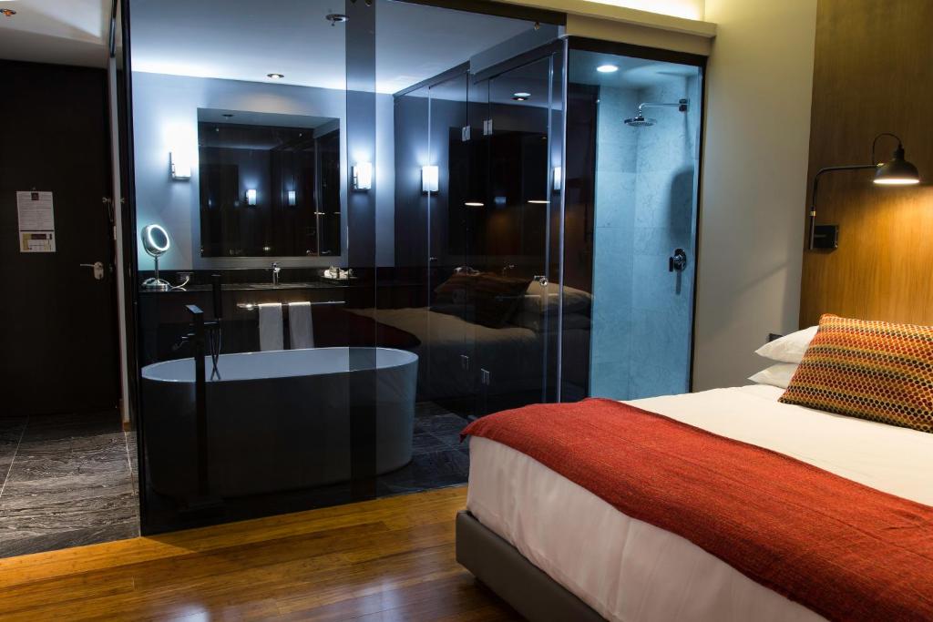 Postel nebo postele na pokoji v ubytování Hotel Love It CAS Consulado