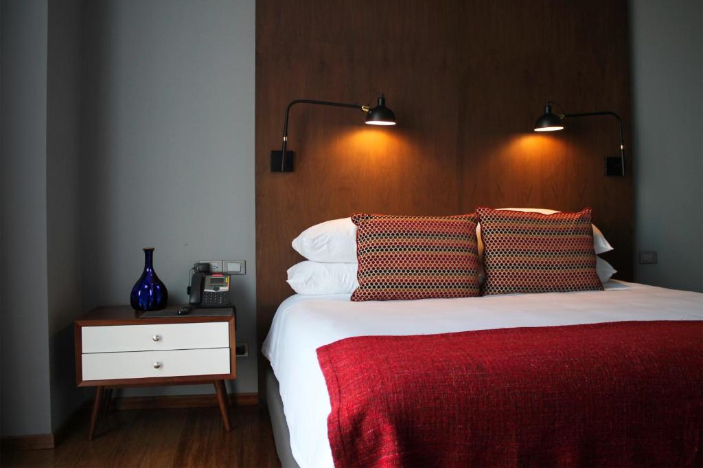 Postel nebo postele na pokoji v ubytování Hotel Love It CAS Consulado