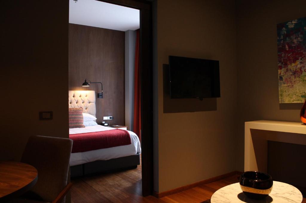 Postel nebo postele na pokoji v ubytování Hotel Love It CAS Consulado