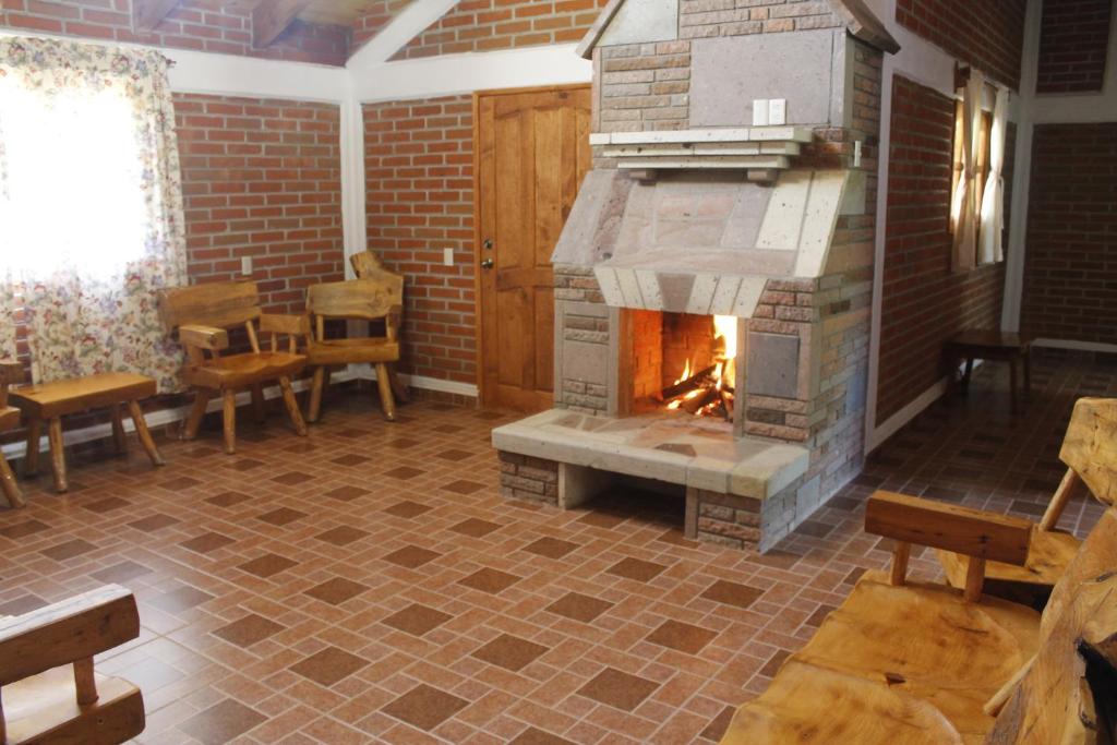 Posezení v ubytování Cabañas Rincón Escondido