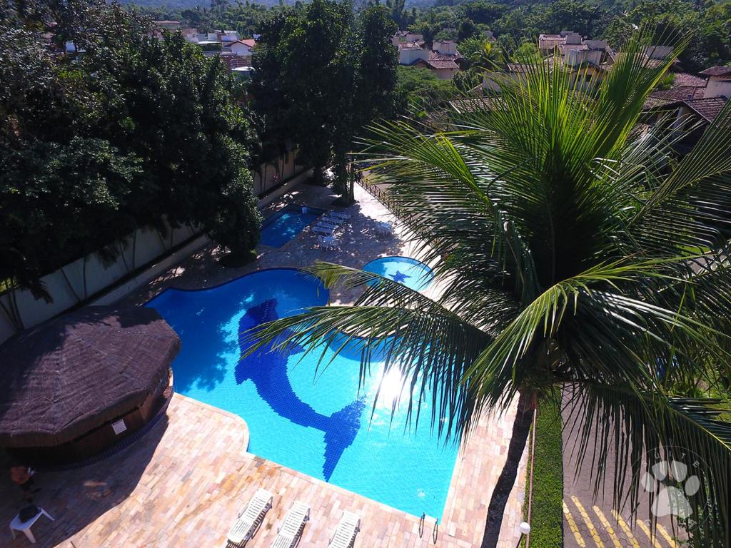 Výhľad na bazén v ubytovaní Canto do mar Maresias alebo v jeho blízkosti