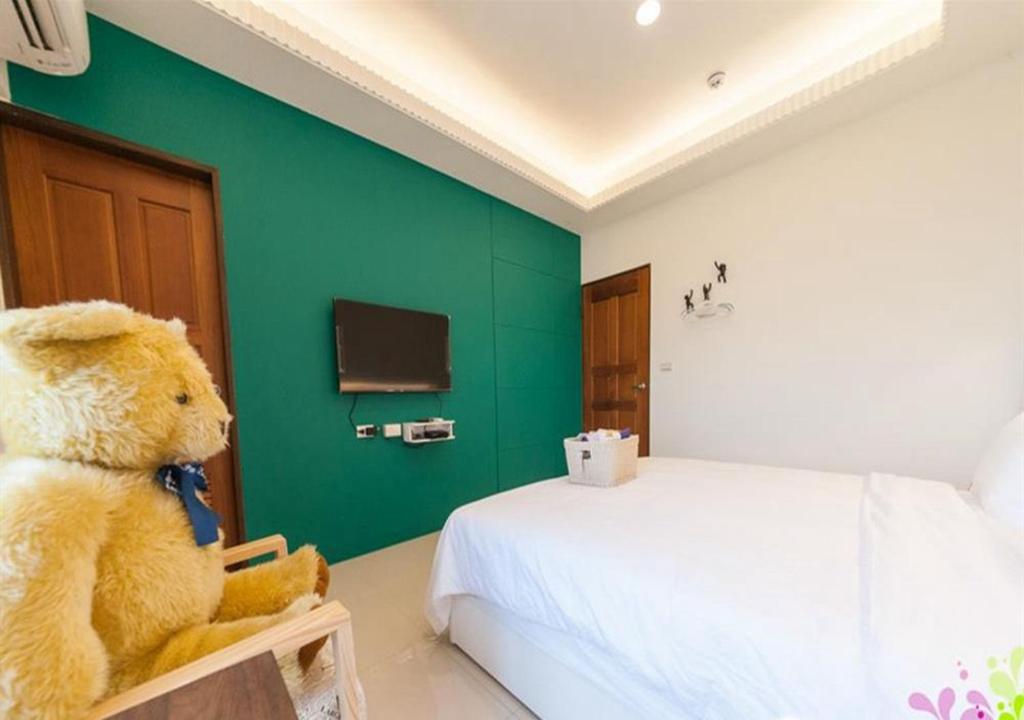 Postel nebo postele na pokoji v ubytování Manman B&B