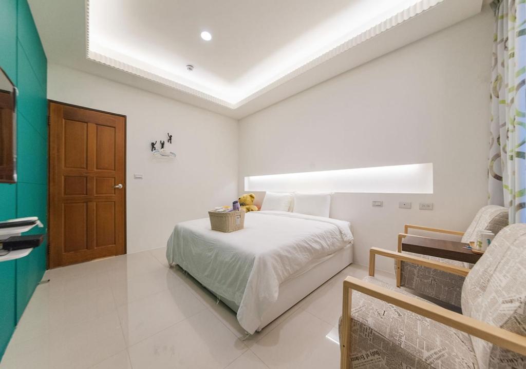 Postel nebo postele na pokoji v ubytování Manman B&B