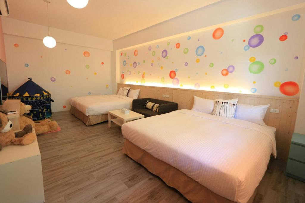 Postel nebo postele na pokoji v ubytování Seven beauties Homestay
