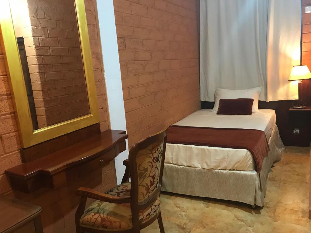 Postel nebo postele na pokoji v ubytování Hotel 4 U Saliya Garden