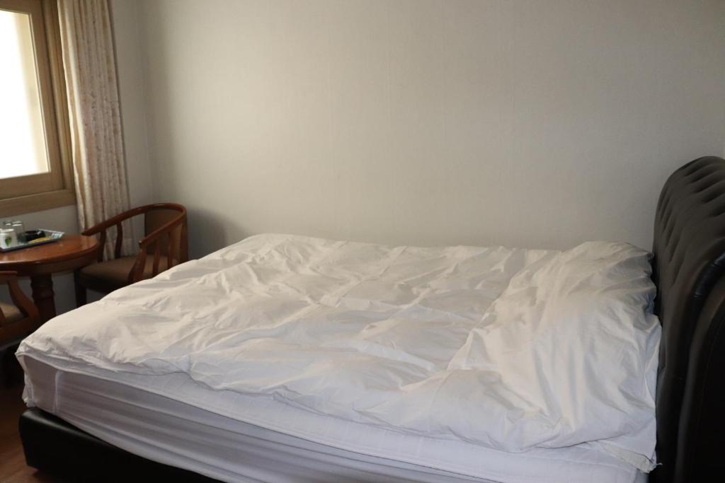 Postel nebo postele na pokoji v ubytování Orasung Motel