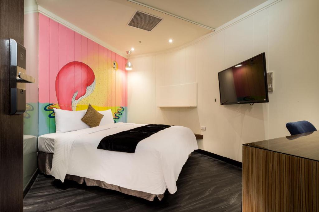 TV a/nebo společenská místnost v ubytování Merryday Hotel Banqiao