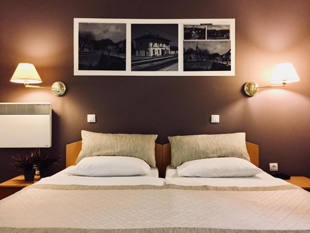 En eller flere senger på et rom på Hotel Leonardo
