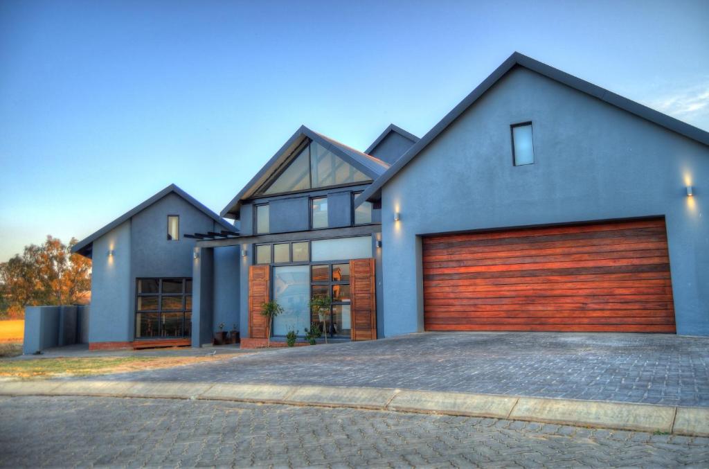 a large house with a garage at 142 Vaal de Grace in Parys