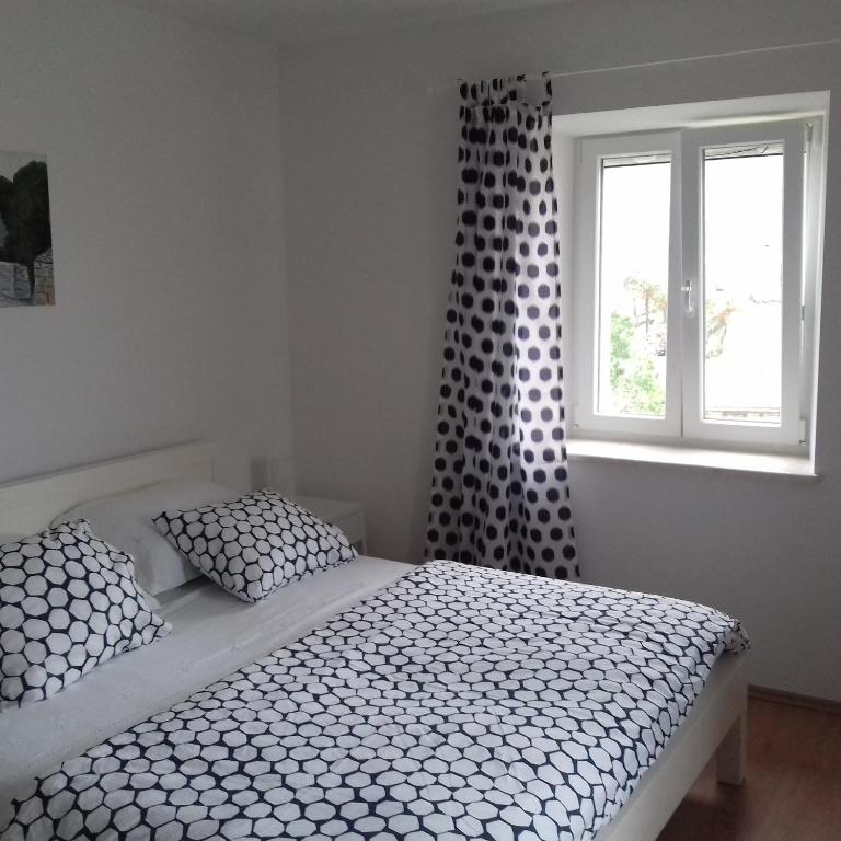 Posteľ alebo postele v izbe v ubytovaní Apartments An Ni