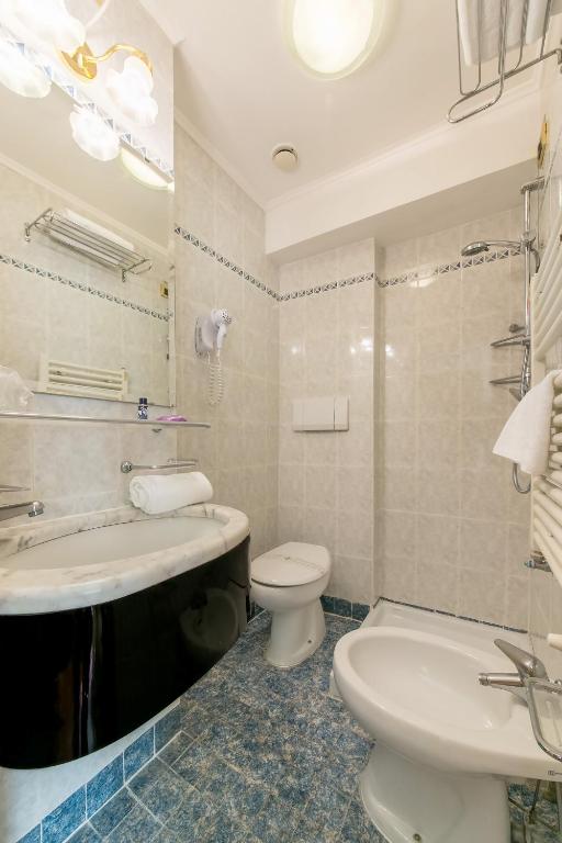 Koupelna v ubytování Hotel Pantalon