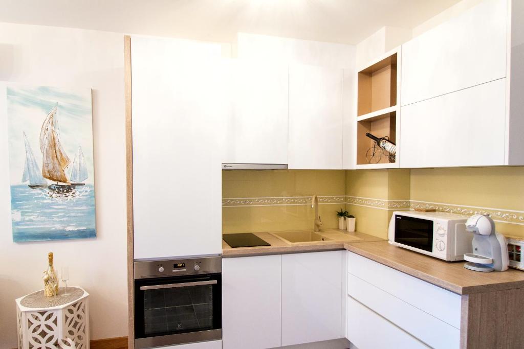 Kuchyňa alebo kuchynka v ubytovaní Luxury Apartment Sweet Dreams