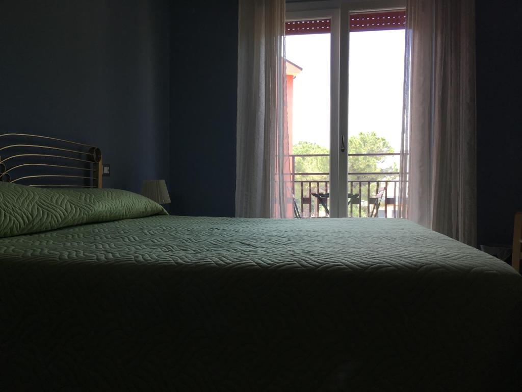 Posteľ alebo postele v izbe v ubytovaní B&B AMICI MIEI