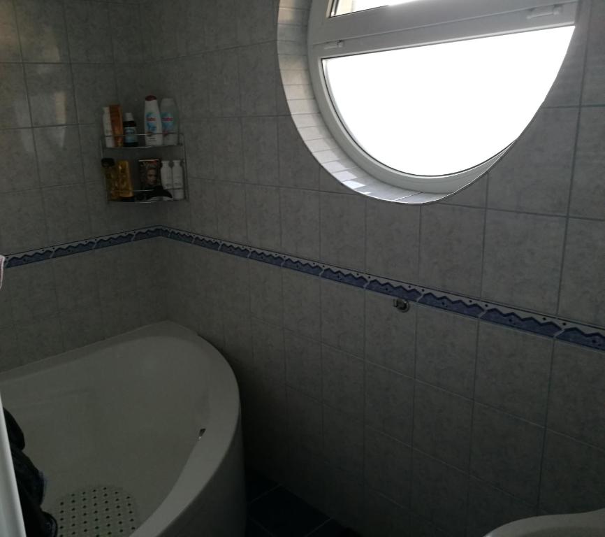 Ванная комната в Kiskuckó Apartman