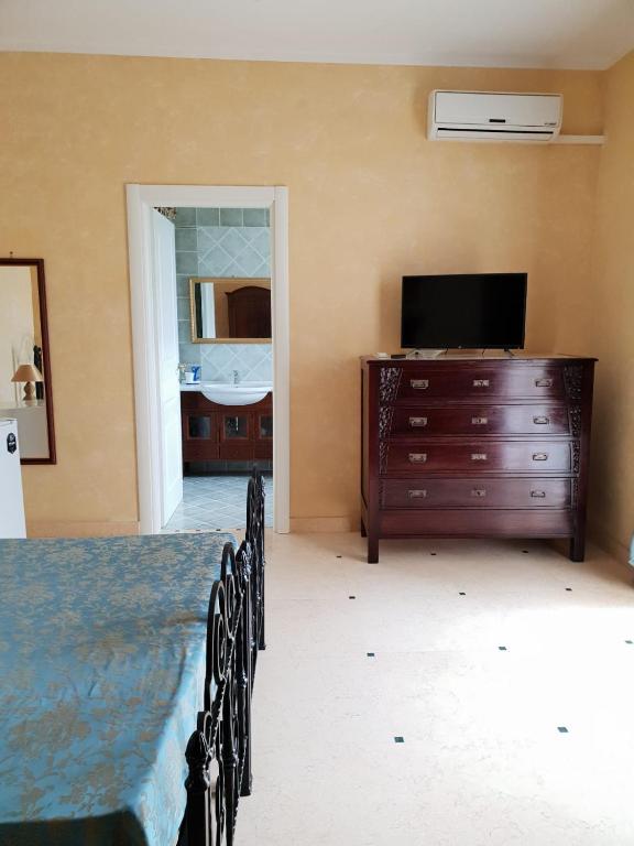 TV a/nebo společenská místnost v ubytování Villa Belvedere di Rita