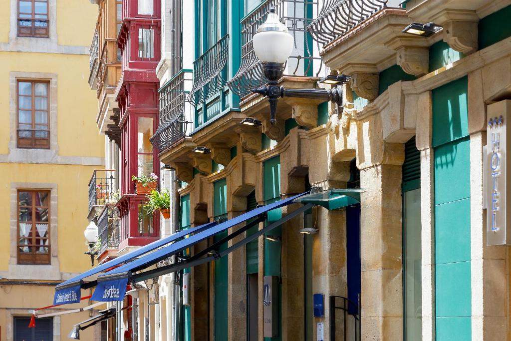 a row of buildings on a city street at Hotel Santa Rosa, Blue Hoteles in Gijón