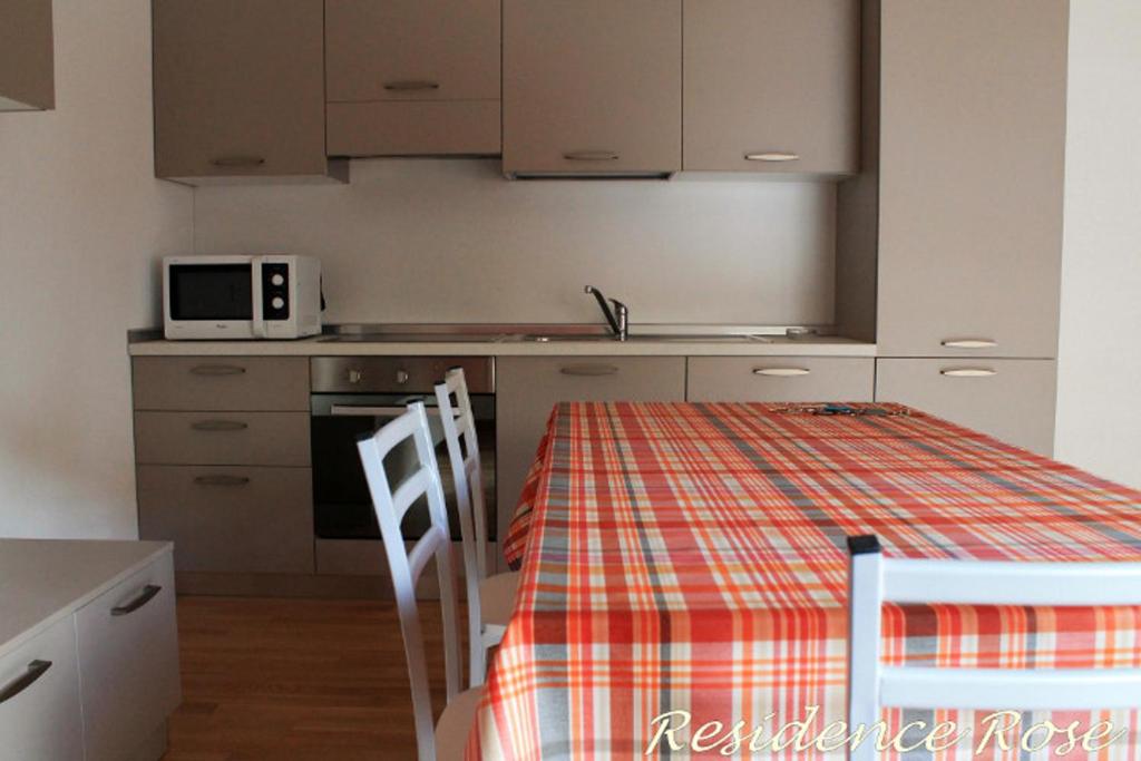 Kuchyň nebo kuchyňský kout v ubytování Residence Rose