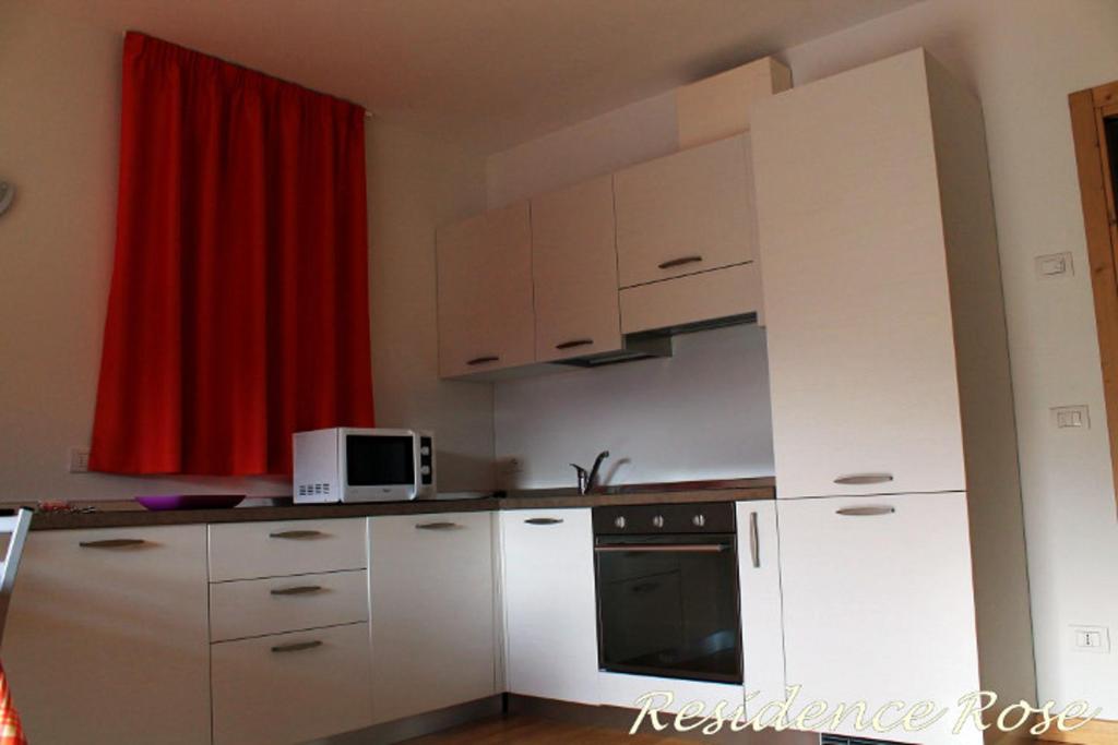 Kuchyň nebo kuchyňský kout v ubytování Residence Rose