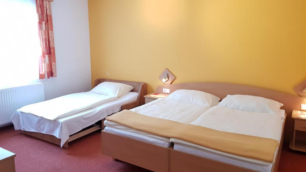 Cama o camas de una habitación en Roseggerhof