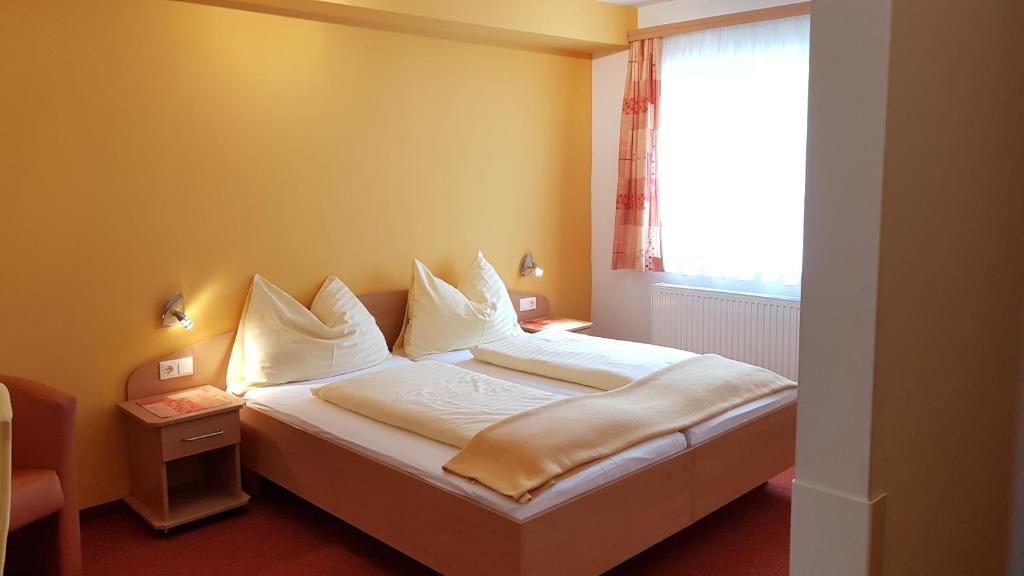 Cama o camas de una habitación en Roseggerhof