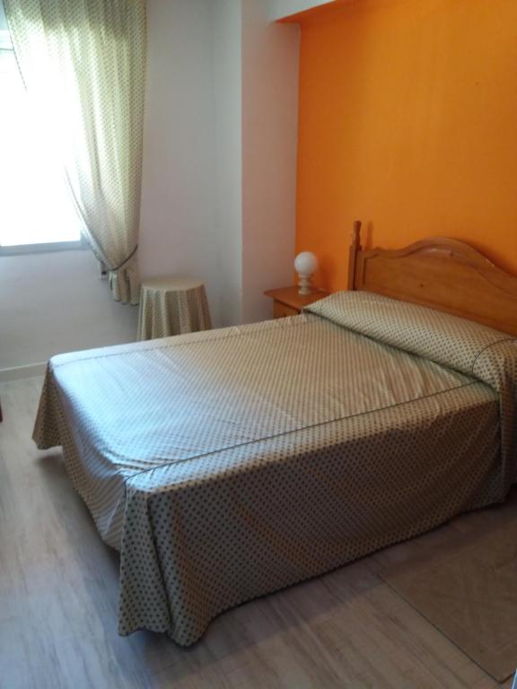 Postel nebo postele na pokoji v ubytování Acogedor Apartamento 2ª línea playa
