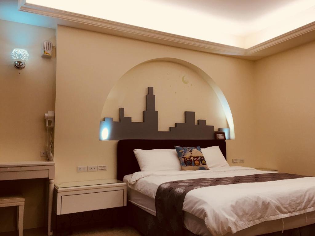 Postel nebo postele na pokoji v ubytování Sweetlight B&B