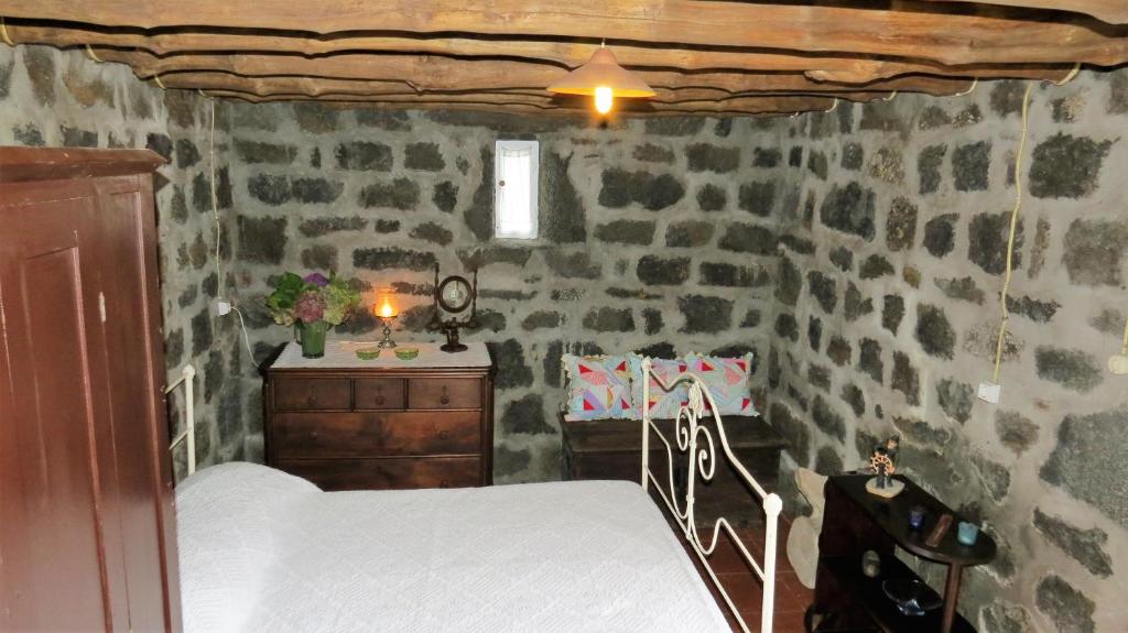 Postel nebo postele na pokoji v ubytování Casa Adega Alto do Passinho
