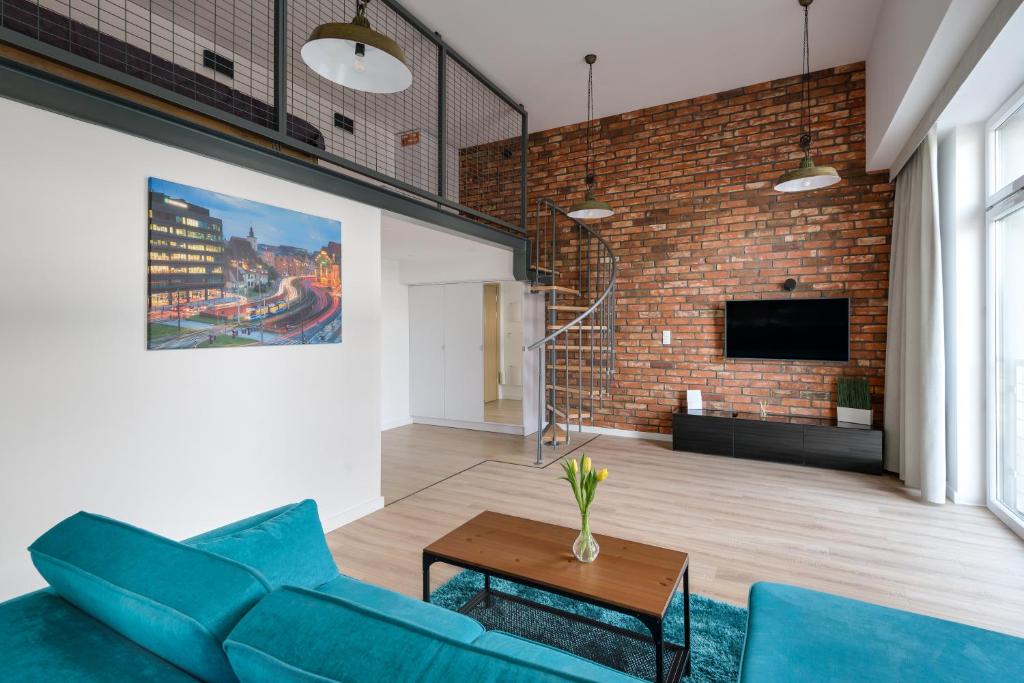TV a/nebo společenská místnost v ubytování Easy Apartments Wrocław
