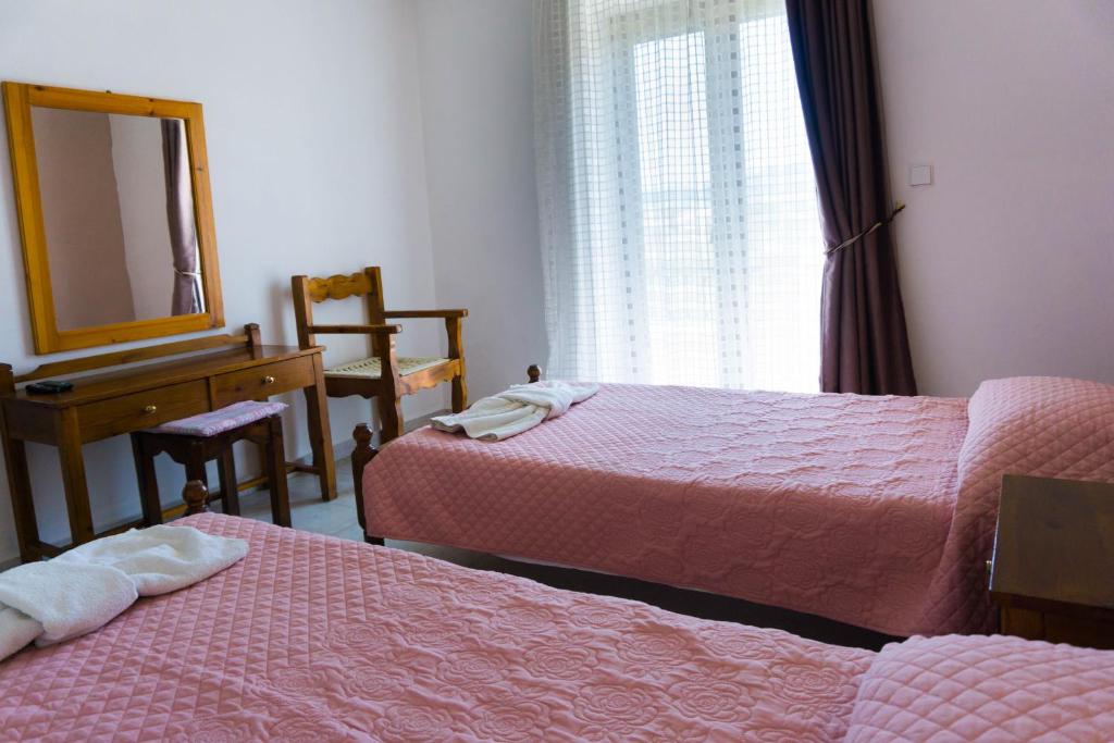 Postel nebo postele na pokoji v ubytování Venus Apartments
